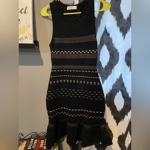 Beautifully detailed black and nude dress